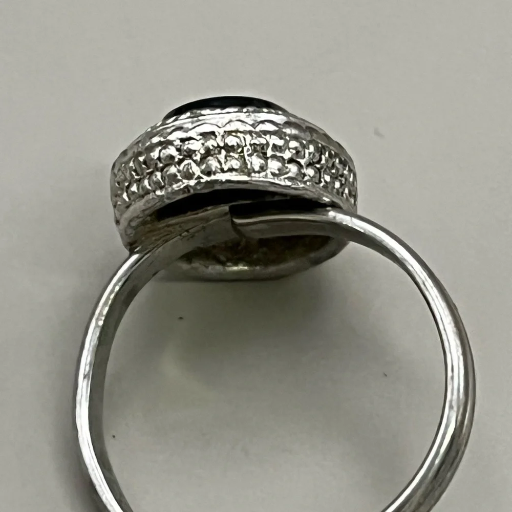 Vintage-Inspired Silver and Black Ring with Ornate Setting